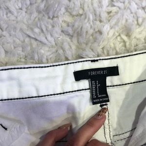 white denim-material skirt